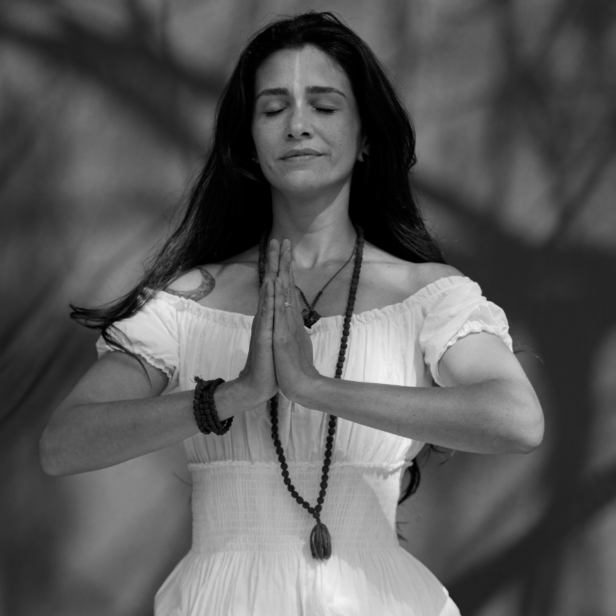 When to meditate - woman meditating - black and white photo