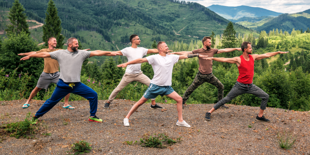 Benefits of Yoga for men. Group of men doing warrior pose